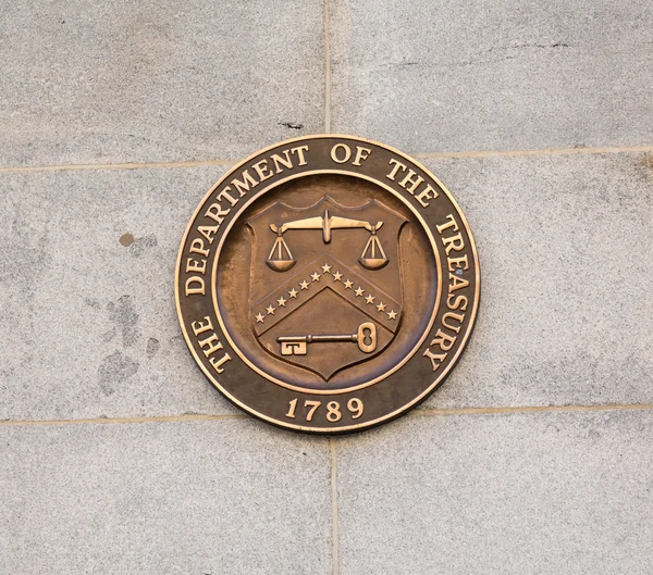 depositphotos_29319711-stock-photo-seal-on-treasury-building-washington